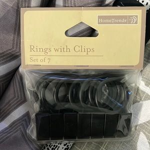New and never used Shower curtain rings with clips! Set of 7